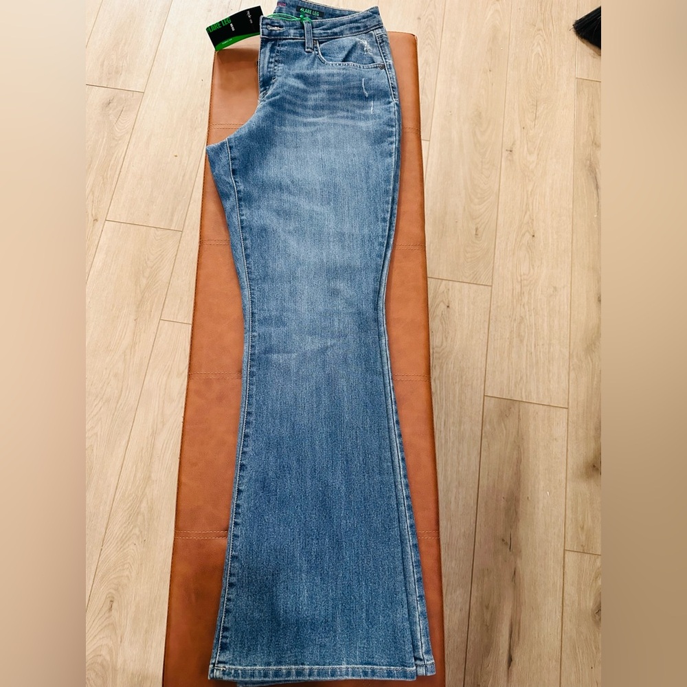 NEVER WORN/NEW. Size 10 Flare Leg, Mid-rise jeans. Brand Style and Co. Med-rinse